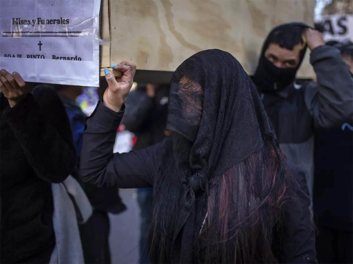 The paycheck has died  Argentine workers hold funeral for wages