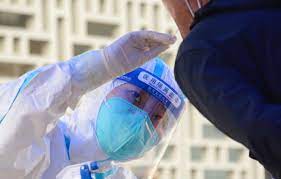 China virus cases at six-month high despite grinding lockdowns