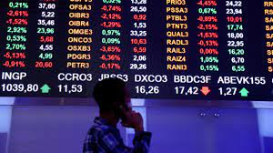 Asian shares inch lower as dollar marches on 