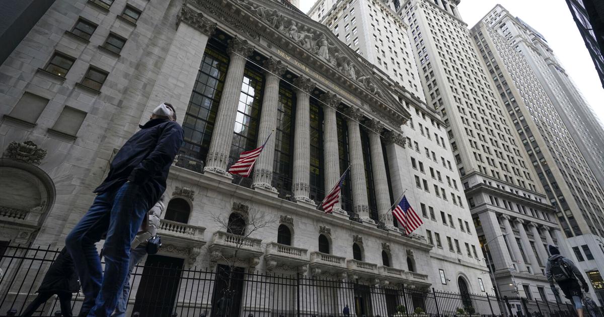 S&P 500 ends lower after volatile session as West hits Russia with sanctions