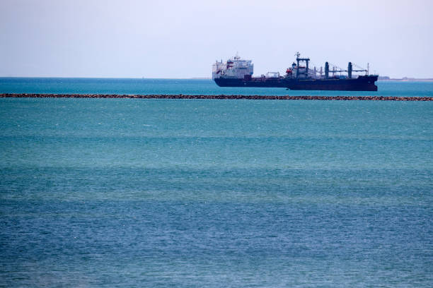 Oil edges lower as salvage operation in Suez Canal goes on