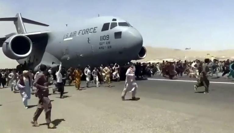 After Afghans fell from plane, families live with horror  