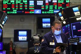 Wall Street rallies, capping frenetic week with best day of the year  