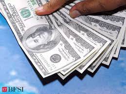 Dollar finds a footing as traders brace for hawkish Fed  