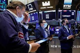 Wall Street closes down, Fed speakers put rate hikes in focus  