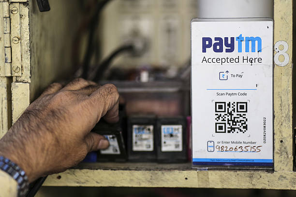 How will users withdraw money from mobile wallets at ATMs?